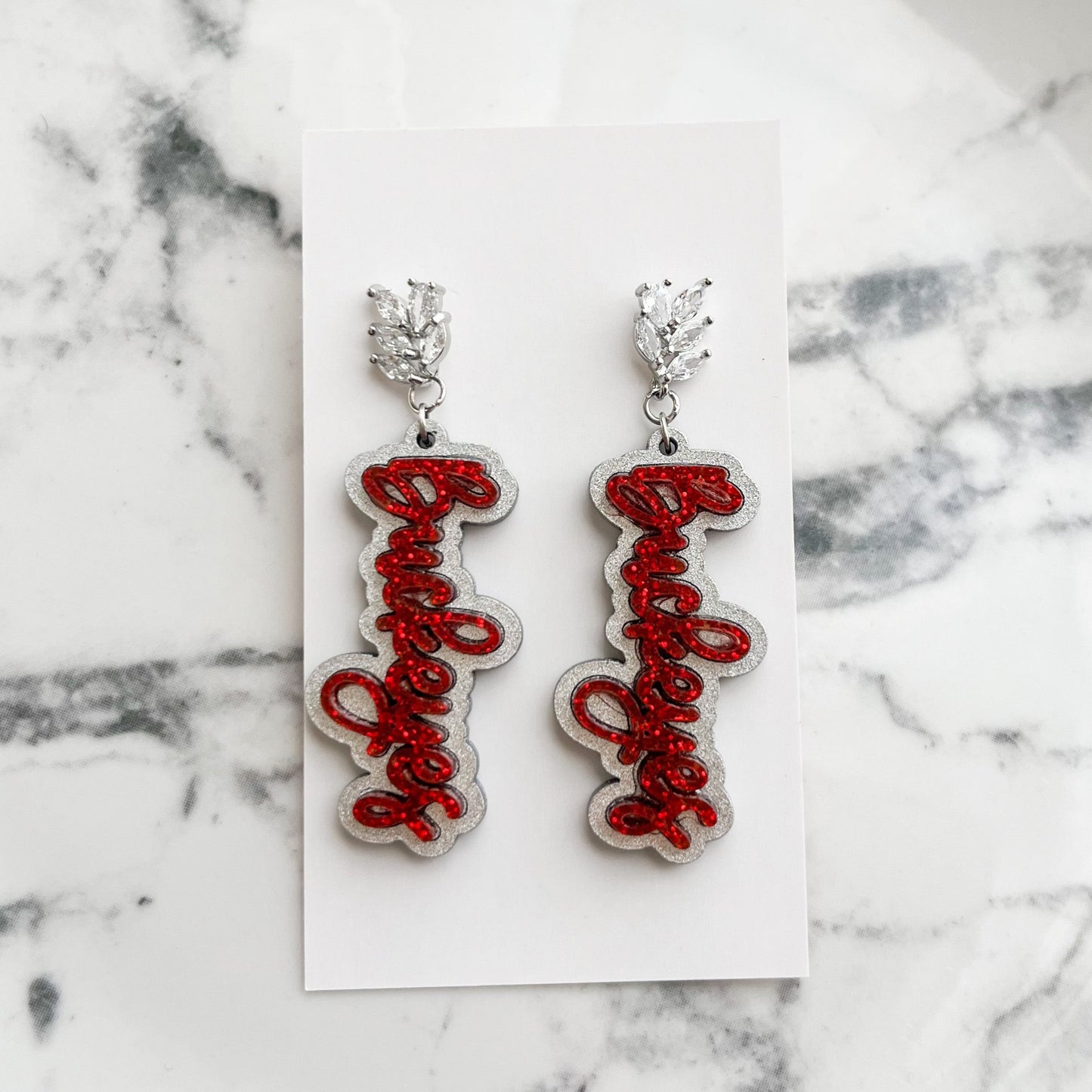 Cubic Zirconia Glitter Buckeyes Script Earrings